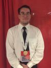 Nick Wallace and his first place medal at the state of Florida's SkillsUSA Competition.