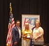 Stacy Young receiving the Outstanding Teacher in Community Service award at FACTE's (Florida Association of Career and Technical Education) 57th Annual State Conference.